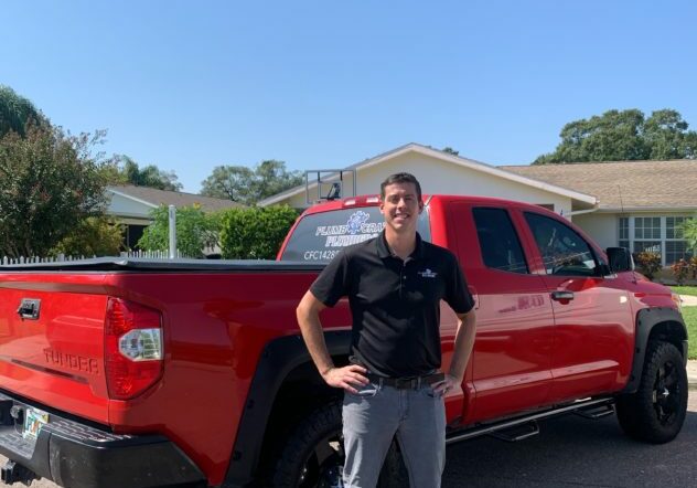 Plumbing Company Owner With Red Truck